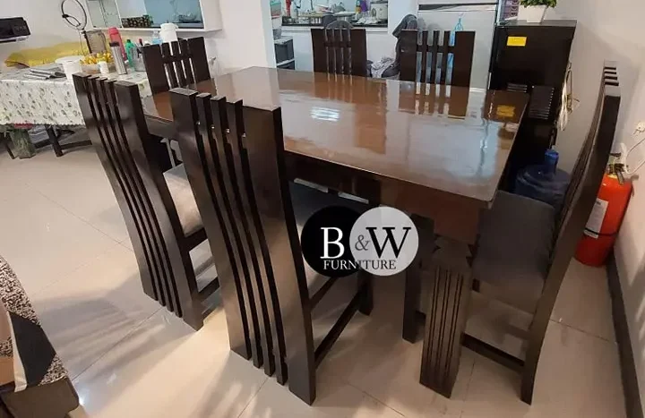 Modern wooden dining table set with matching chairs
