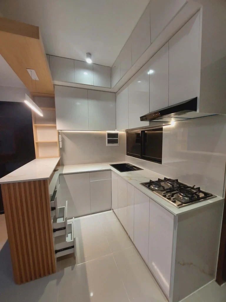 Modern white modular kitchen with built-in appliances