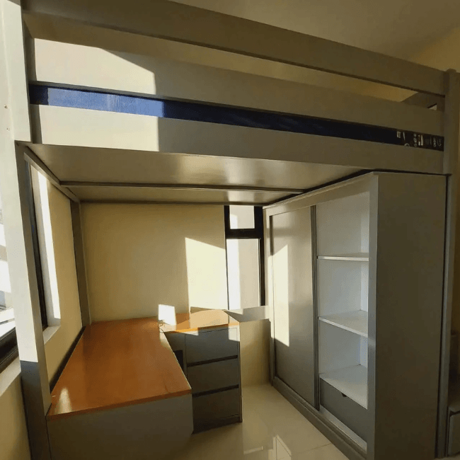 Custom loft bed with built-in study desk, wardrobe cabinet, shelving, and space-saving modern bedroom design.