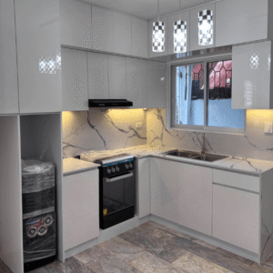 Modern white modular kitchen with built-in appliances